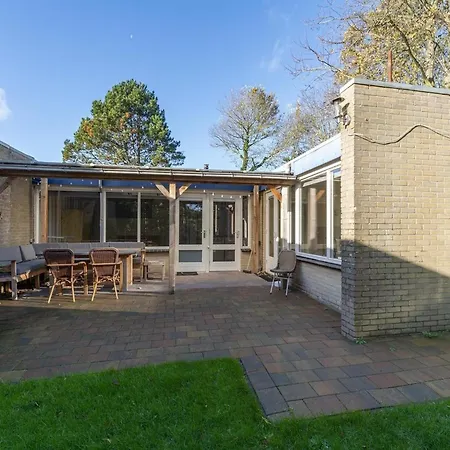 Lovely Bunglow With Patio By Belvilla Sint Maartensvlotbrug